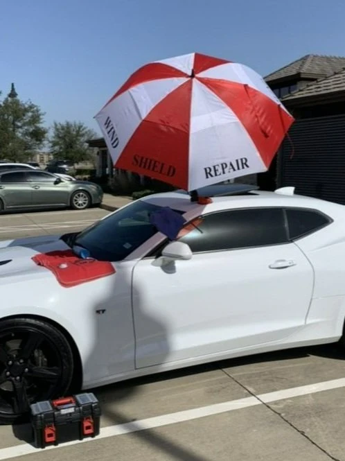 4" crack on white cars windshield